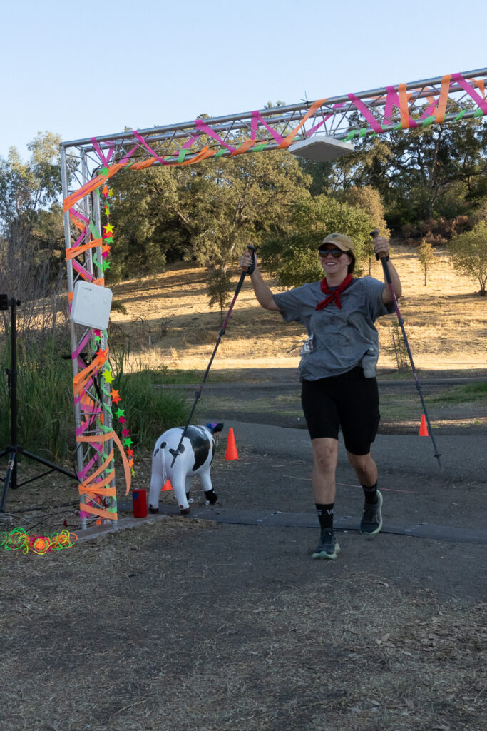 runner crossing finish line