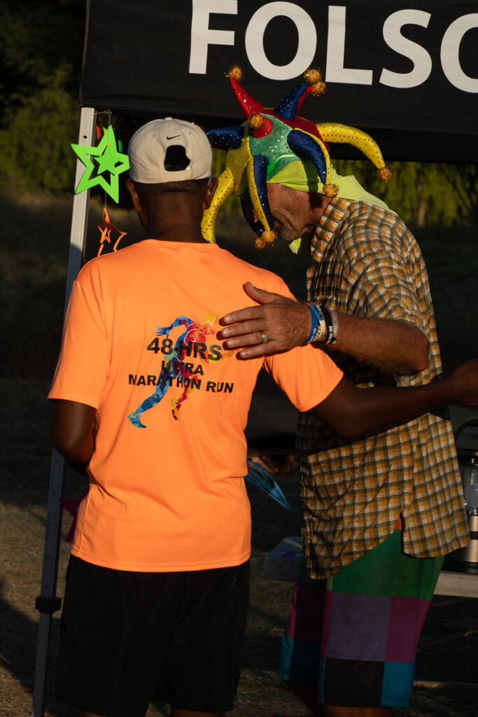 two runners congratulating each other